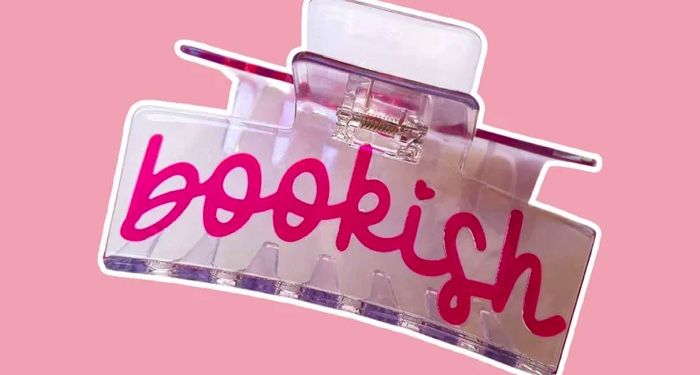 hair clip that says 22bookish22 set against a pink background.jpg.optimal